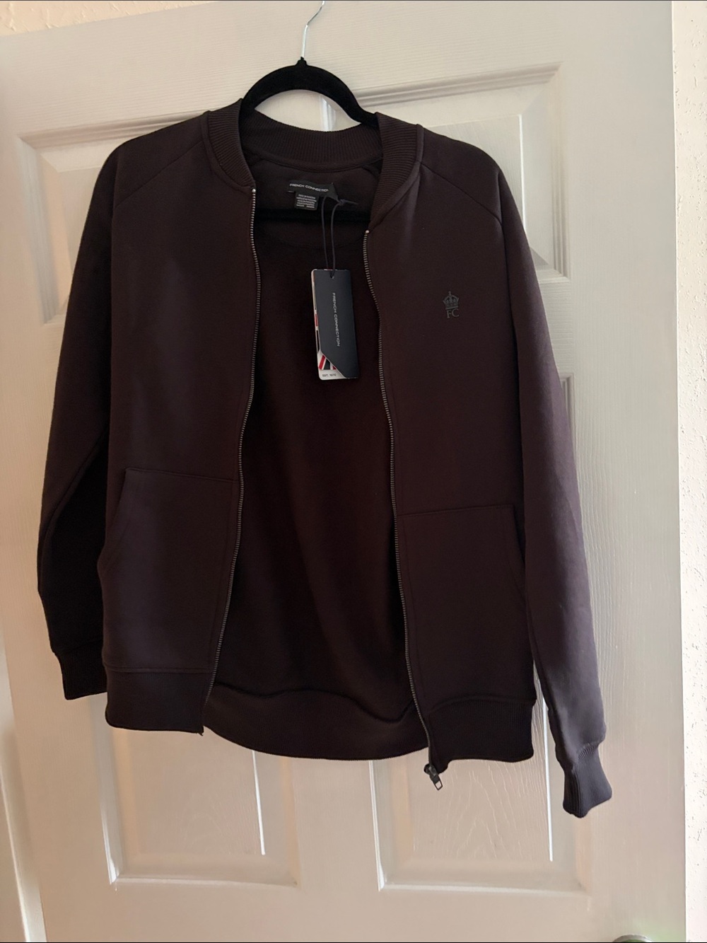 NEW French Connection Women’s Zip Up Sweater. Size medium.